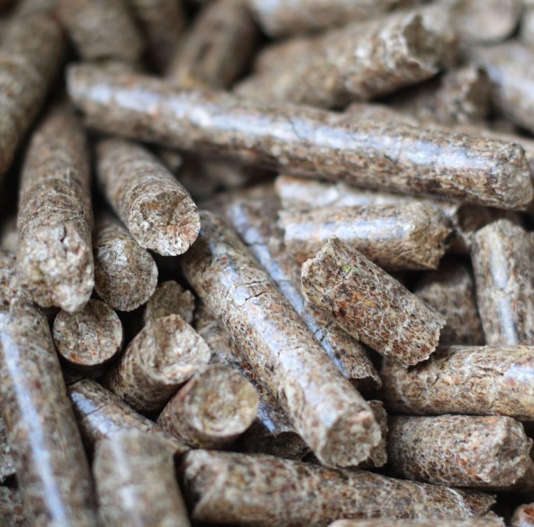 vecteezy_very-good-quality-wood-pellets-ready-to-make-fuel_10647363